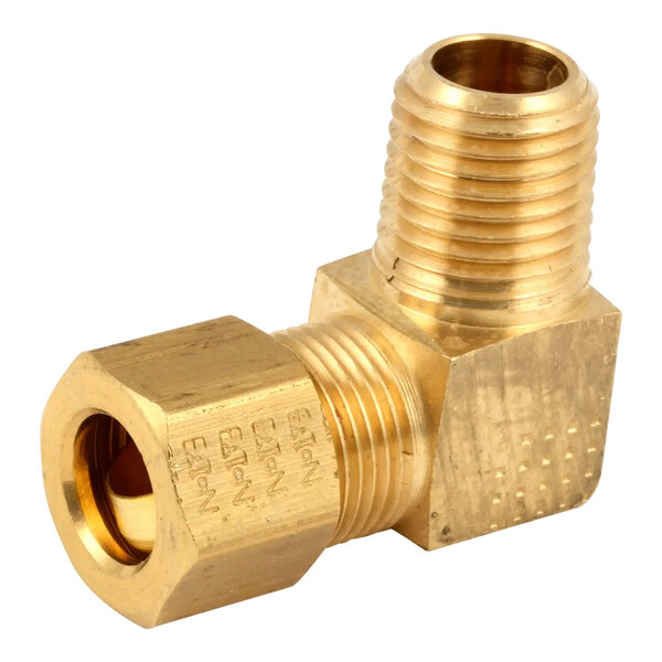 A brass Southbend elbow fitting with a gold metal pipe fitting.