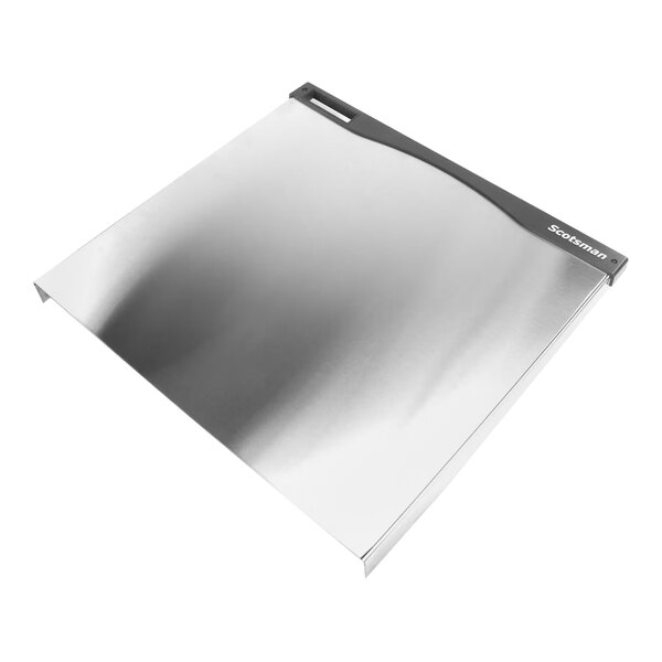 A silver and black metal Scotsman front panel with a black handle.
