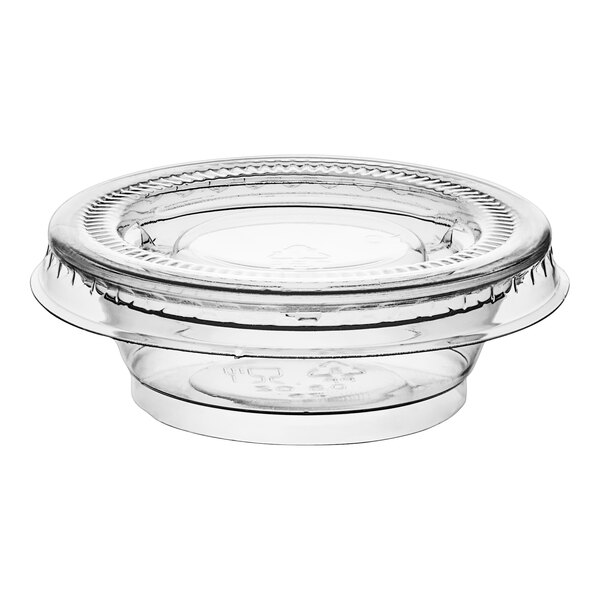 A clear plastic Choice souffle cup with a lid.