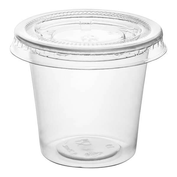 A clear plastic Choice shot glass with a lid.