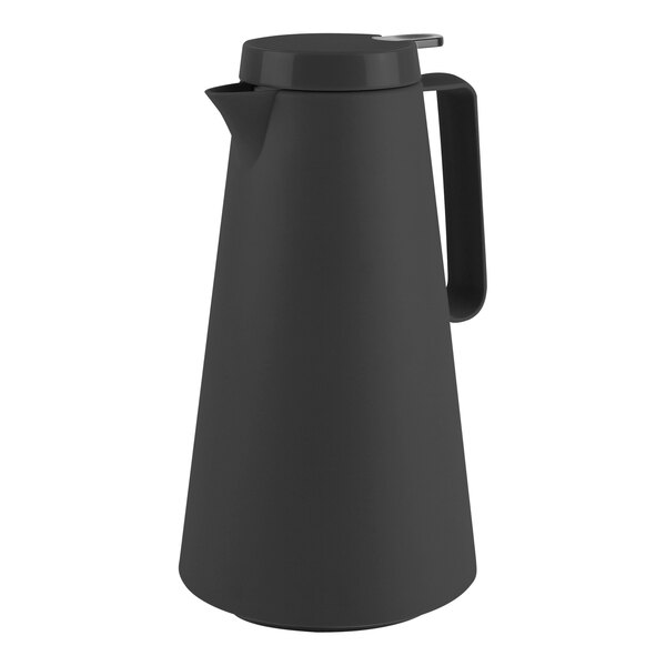 A black metal pitcher with a handle.