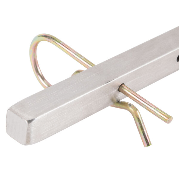 A metal bar with a metal ring on the end.