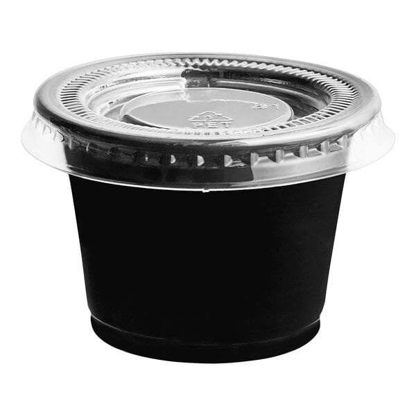 A Choice black plastic souffle cup with a clear plastic lid.