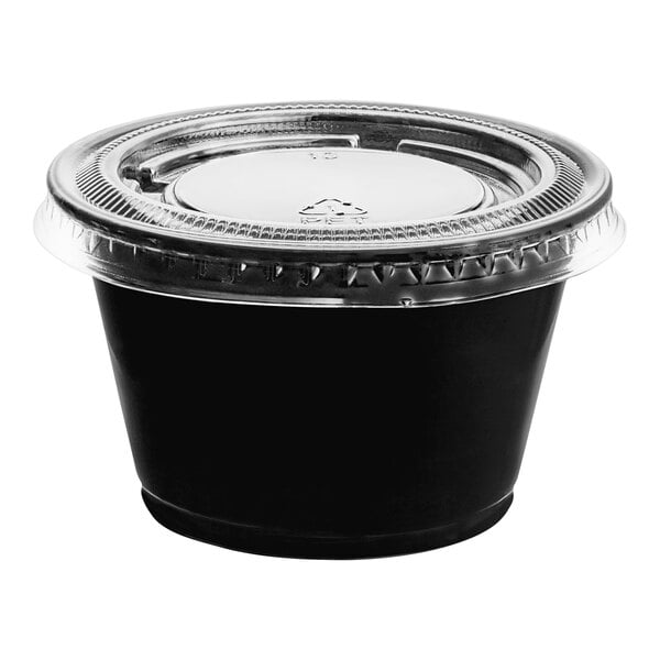 A Choice black plastic souffle container with a clear plastic lid.