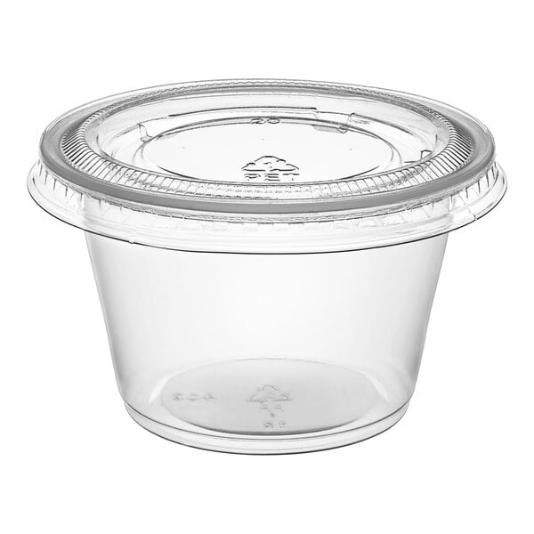 A Choice clear plastic souffle cup with a PET plastic lid.