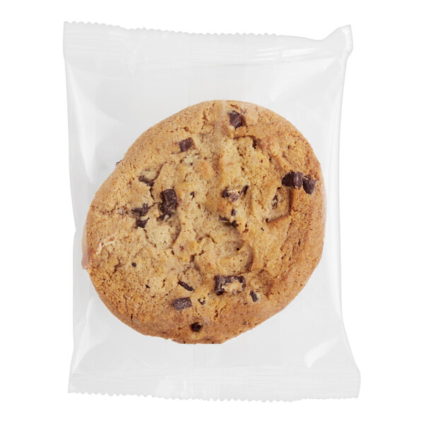 A Root Nine Baking Co. vegan chocolate chunk cookie in a plastic bag.