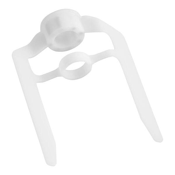 A white plastic Galaxy mixer paddle clip with a circle.