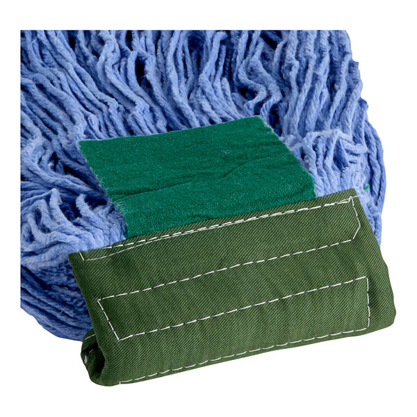 A blue microfiber looped end wet mop head with a green fabric headband.