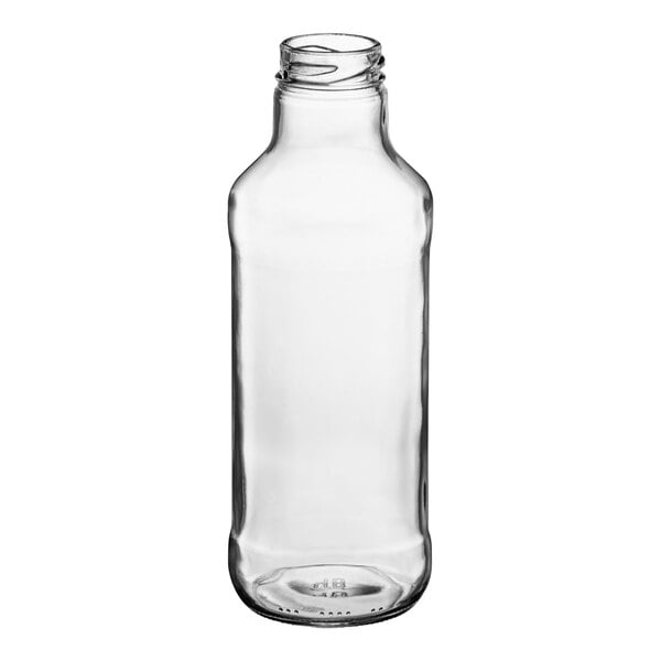 A clear glass juice bottle with a cap.