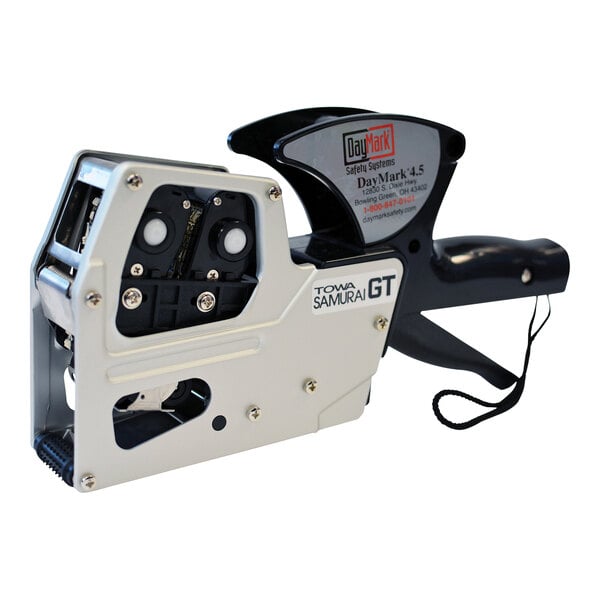 A DayMark metal labeler with a white handle.