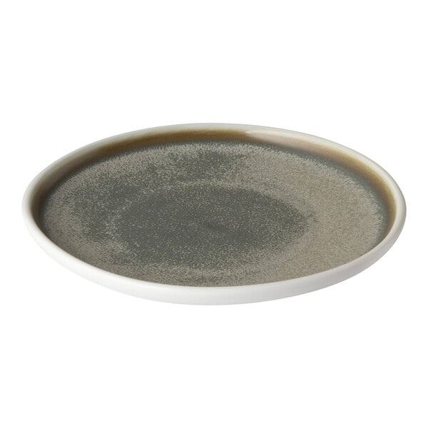 A Bon Chef white porcelain plate with a grey speckled surface.