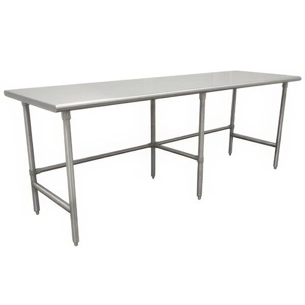 An Advance Tabco stainless steel work table with galvanized steel legs.