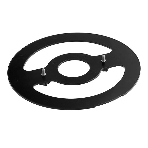 A black circular metal blade removal tool with screws.