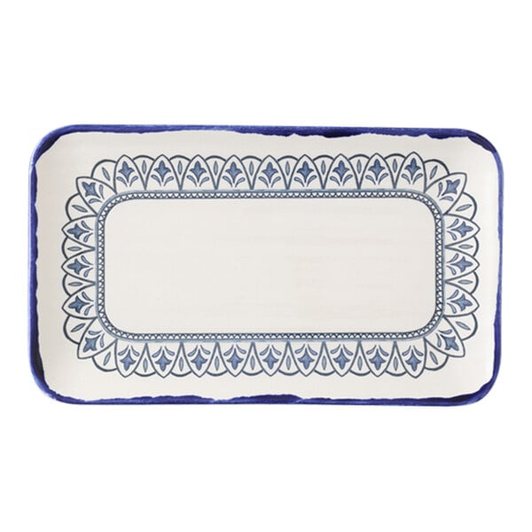 A rectangular white plate with a blue border.