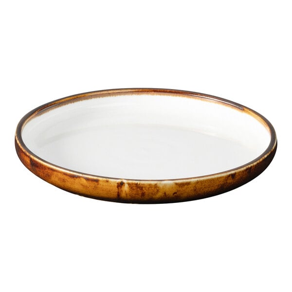 A white and brown Bon Chef Tavola Amaretto porcelain plate with a rim.