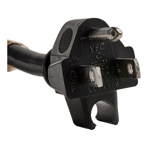The black electrical plug for a Lavex Cold Water Spot Extractor.
