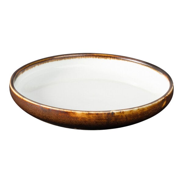 A white porcelain plate with a brown rim.