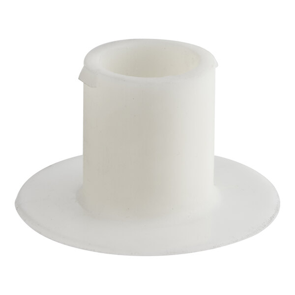 A white plastic cylinder with a hole in the middle.