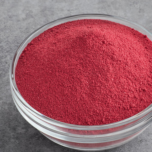 A bowl of Great Western red cherry cotton candy concentrate sugar.