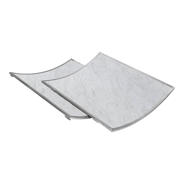 An Eastern Tabletop light marble laminate side panel with a curved stainless steel edge.