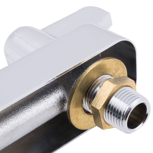 A white and silver metal Equip by T&S deck mounted faucet with lever handles and a swing spout.