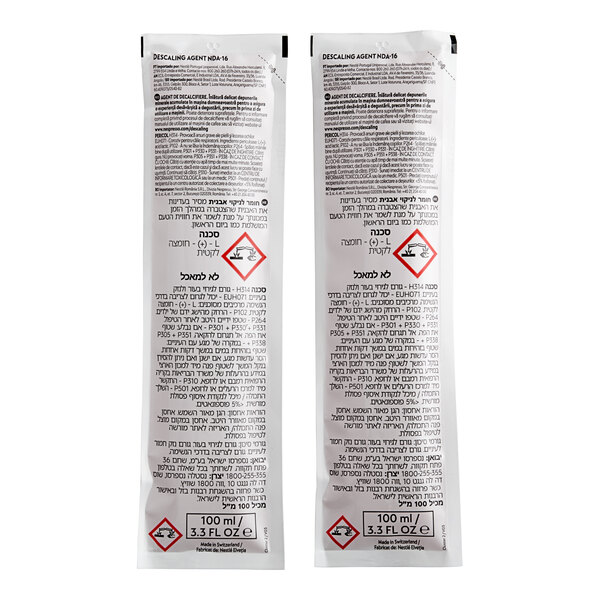 A white Nespresso descaling kit box with black and red text.