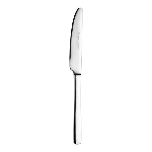 A WNK Silhouette stainless steel dinner knife with a long silver handle.