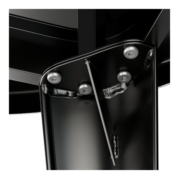 A close-up of a Lancaster Table & Seating black metal table top.