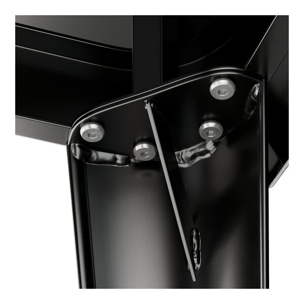 A close-up of a black metal Lancaster Table & Seating outdoor table.