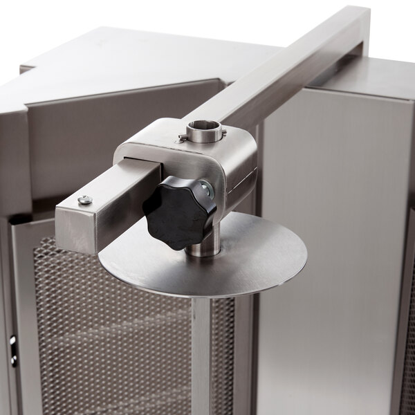 A stainless steel door with a black knob on a Visvardis gyro machine.