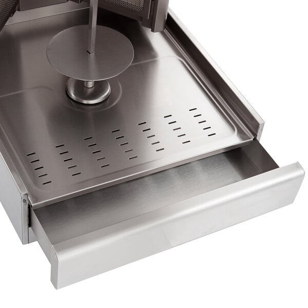 A stainless steel Visvardis gyro machine on a counter.