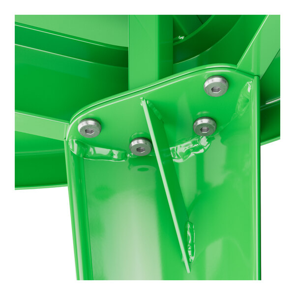 A close-up of a green metal pole with screws on it.