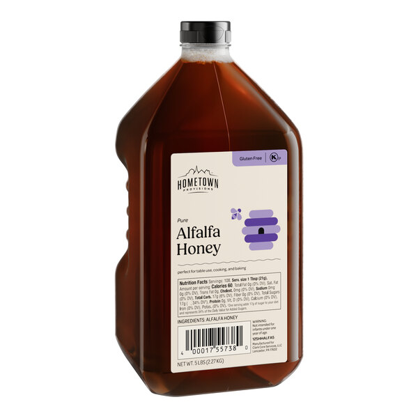 A bottle of Hometown Provisions Alfalfa Honey with a white label.