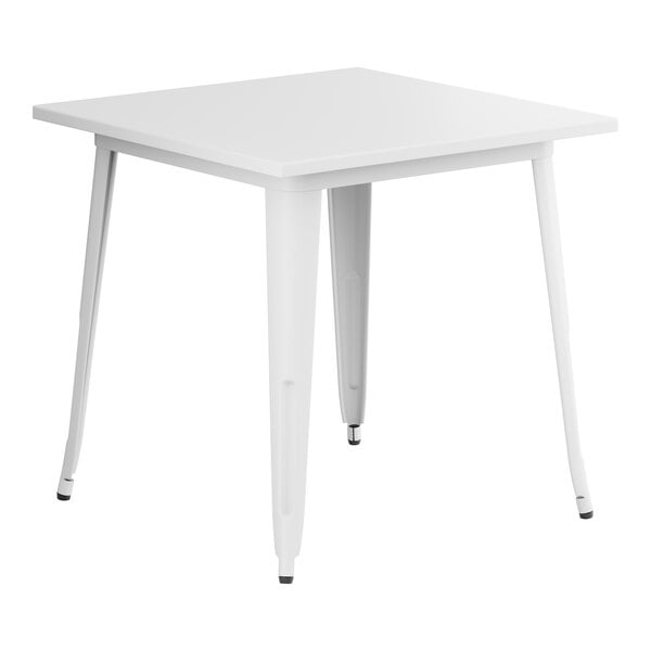 A white square Lancaster Table & Seating outdoor table with metal legs.