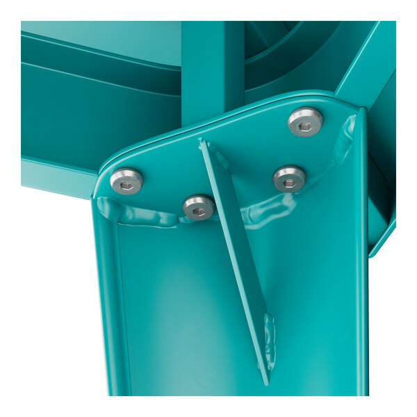 A close-up of a teal metal Lancaster Table & Seating table top.