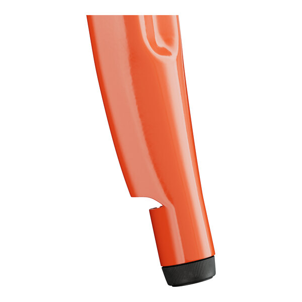 A close-up of an orange object with a white background.