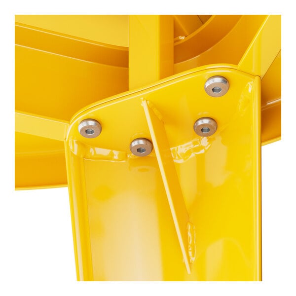 A close up of the yellow metal base for a Lancaster Table & Seating bar height table.