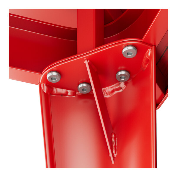 The red metal structure of a Lancaster Table & Seating outdoor table.