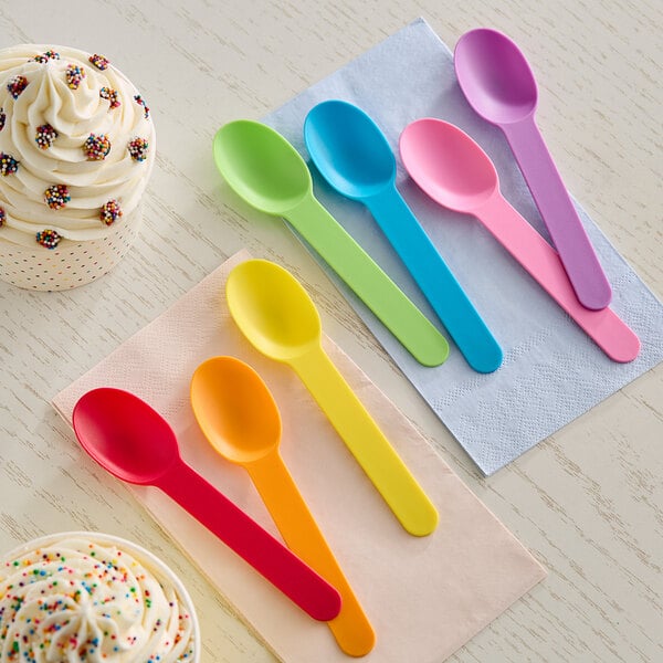 A group of colorful plastic spoons.