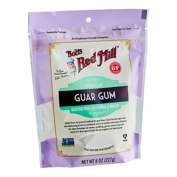 A close up of a package of Bob's Red Mill Guar Gum on a white background.