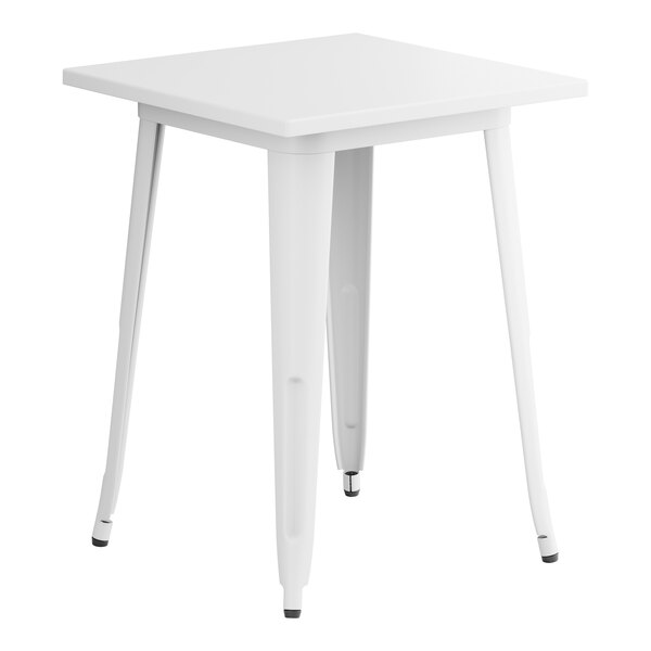A white square Lancaster Table & Seating outdoor table with legs.
