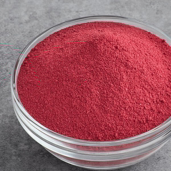 A bowl of Great Western Red Cherry cotton candy concentrate sugar.