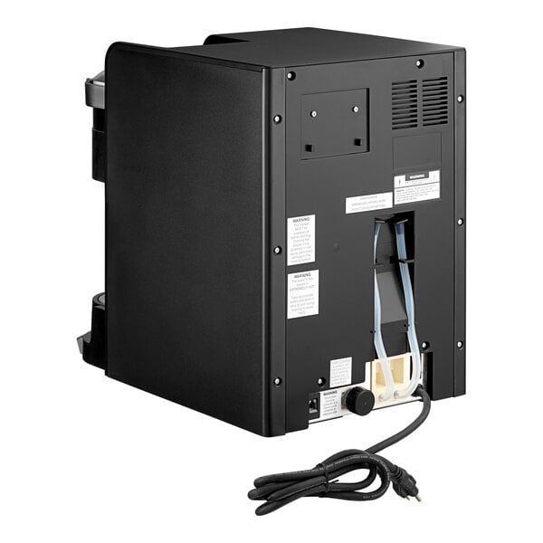 A black rectangular Keurig coffee maker with white text and wires.