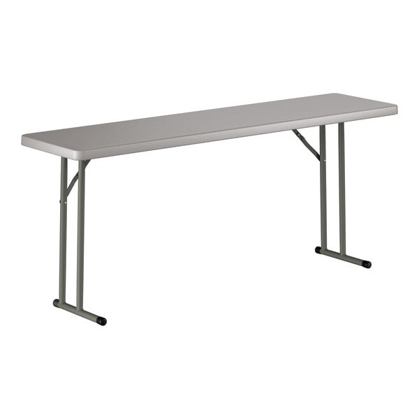A gray heavy-duty blow molded plastic folding table with gray metal legs, measuring 18 by 72 inches.