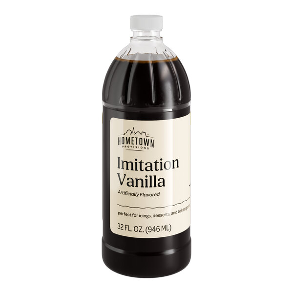 A black and white bottle of Hometown Provisions imitation vanilla liquid with a white label.