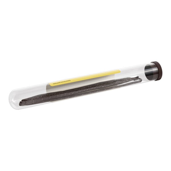A Hometown Provisions test tube with black vanilla beans inside and a brown cap.