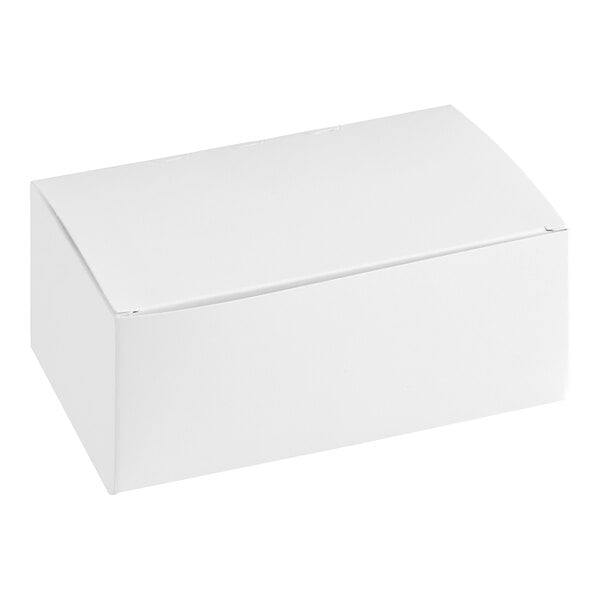 A Southern Champion white cookie box with a lid.