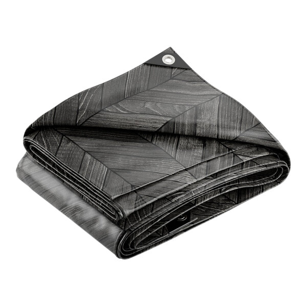 A folded black and grey chevron patterned tarp.