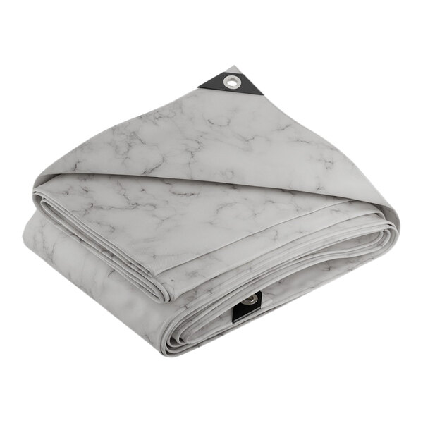 A folded white and grey CORE Heavy Duty Tarp.