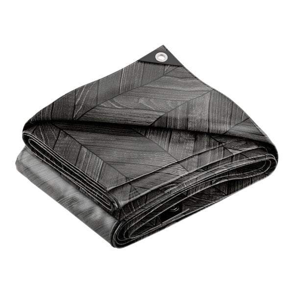 A folded black and grey chevron patterned tarp.